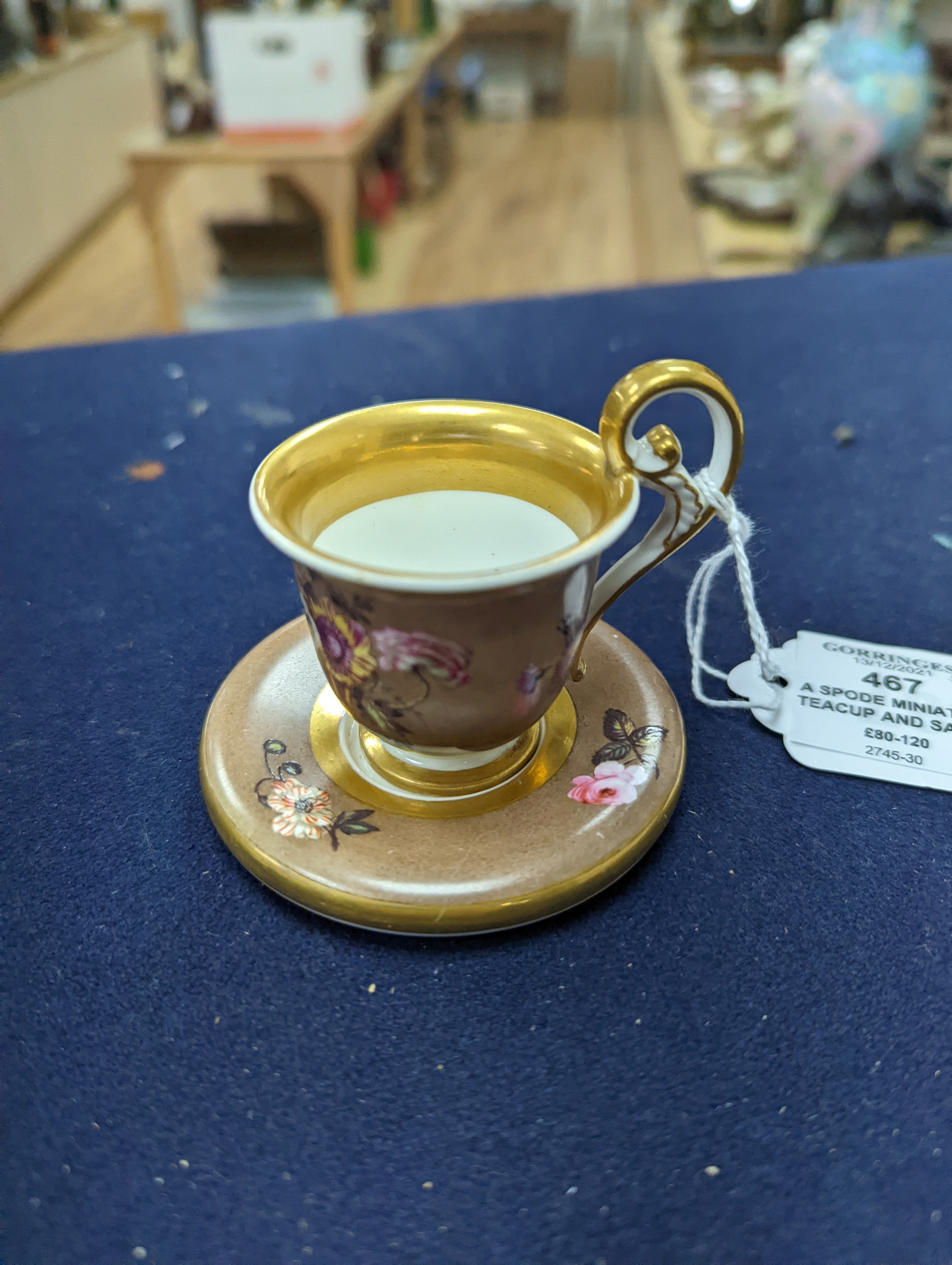 A Spode miniature teacup and saucer, c.1820. Provenance - Mona Sattin collection of miniature cups and saucers, collection no. 119.